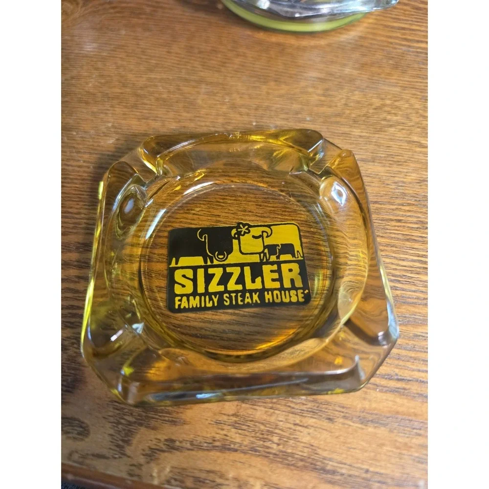 SIZZLER Family Steakhouse Vintage Amber Ashtray  3.5 In x 3.5 In USED Great Cond